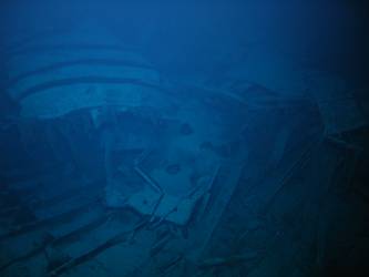 Large piece of twisted steel plate on seabed